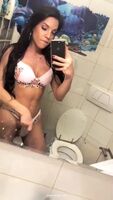 Hot girl strokes her cock in the bathroom