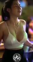 Who is this Extremely hot Asian Chick Jiggling her Tits out?