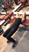 Some light stretching in yoga pants