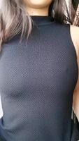 This tight black top hides so much...