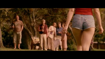 Gemma Arterton walking away in VERY small jean shorts