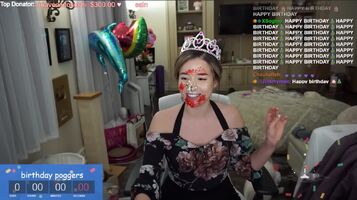Pokimane chilling on stream with her birthday cake smeared on her face