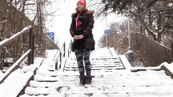 Desperate pee on the snowy stairs