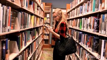 Kendra Sunderland Flashing In A Library