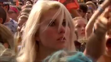 Shy blonde at concert with not so shy friend