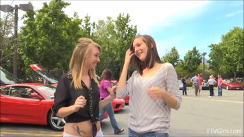 Revealing her friend's boob at the car show