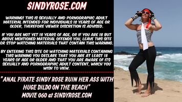 Anal pirate Sindy Rose ruin her ass with huge dildo on the beach